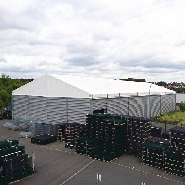 Grand entrepôt industriel tente de stockage résistant aux UV PVC imperméable ignifuge Sandwich feuilles d'acier durables tissu utilisation extérieure Logo