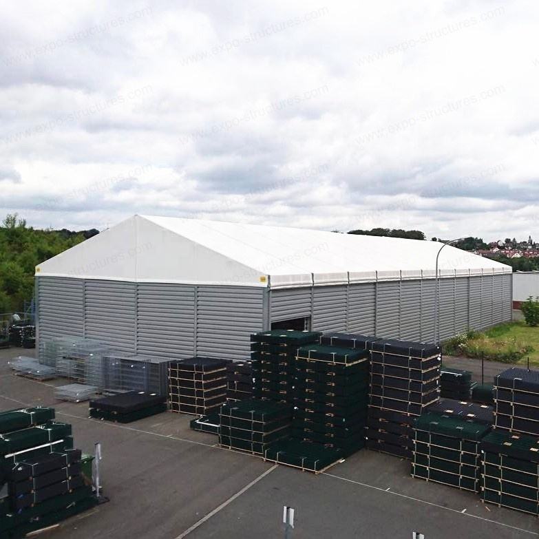 Grand entrepôt industriel tente de stockage résistant aux UV PVC imperméable ignifuge Sandwich feuilles d'acier durables tissu utilisation extérieure Logo